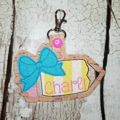 pencil bow snap tab applique